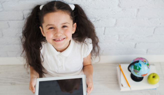girl with ipad smiling-webSPOTLIGHT ON SPECIALIST TEACHING